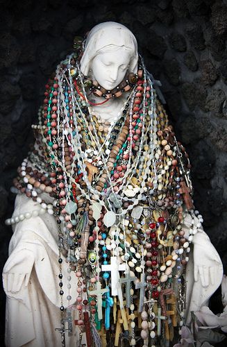 This statue of The Madonna was covered in rosaries, placed by random people passing by. (She was located outside a gas station.) via SheepInABottle Flickr Home Altar, Blessed Mother Mary, Holy Mary, Hail Mary, Religious Icons, Blessed Virgin, Blessed Virgin Mary, Blessed Mother, Mother Mary