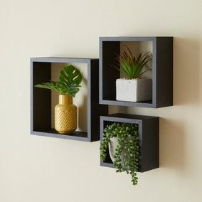 Sqaure Wall Shelves, Unique Wall Shelves Bedroom, Square Shelf Ideas, Square Floating Shelves Cubes, Cube Shelves Bedroom, Black Floating Shelves Bedroom, Square Shelves Decor Cubes, Wall Cubes Ideas Decor, Cube Shelves Decor