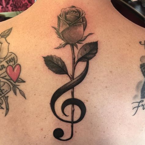 Super cool treble clef/rose tattoo by the super cool @artofkevinlewis. ❤️🎼❤️ Clef Tattoo, Rose Vine Tattoos, Treble Clef Tattoo, Pinterest Tattoo Ideas, Rose Tattoos For Women, Small Rose Tattoo, Music Tattoo Designs, Tattoo Zeichnungen, Note Tattoo