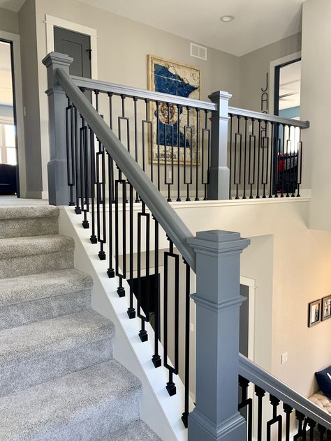 Black iron staircase and spindles, Sherwin Williams Repose Gray paint Gray Railings For Stairs, Trendy Flooring Ideas 2022, Iron Railings Indoor Staircases, Black Iron Spindles Staircase, Black And Gray Staircase, Black Spindle Staircase, Gray Stair Railing, Iron Spindles On Stairs, Staircase Black Spindles