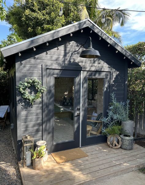 A Bold, Black She Shed Adds Drama to Landscape Designer's Back Yard Black She Shed, Black Aluminum Windows, She Shed Living, Shed Living, Shed Exterior Ideas, Sheds Ideas Backyard, Black Shed, Cool Sheds, Shed Landscaping