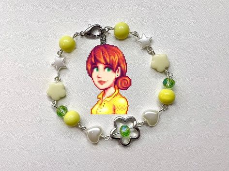 stardew valley bracelets?!?!? just listed on my etsy (only one of each 😱) . . . . . . #jewelry #artist #crafts #smallbusiness #stardewvalley #stardew #bracelets #instadaily #instaart Jewelry Artist, Stardew Valley, May 31, Insta Art, Lily, Gifts, On Instagram, Quick Saves, Instagram