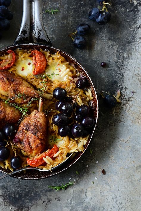 Why use a lot of pots and pans when chicken and orzo can be cooked in one? This roasted chicken with grapes and orzo is ridiculously easy to make, perfectly buttery and delicious with lots of melted cheese. This could be the most comforting meal ever.  Roasted chicken nestled in a mixture of tiny orzo pasta with sun dried tomatoes, grapes and mozzarella. Of course, as you would expect, layers of flavor from onions, garlic, and a few spices.  The final addition of mozzarella and grapes, just ... Chicken With Grapes, Pasta With Sun Dried Tomatoes, Balsamic Roasted Vegetables, Serving Dumplings, Chicken With Orzo, Chicken And Orzo, Spring Pasta, Fairy Food, Breakfast Soup