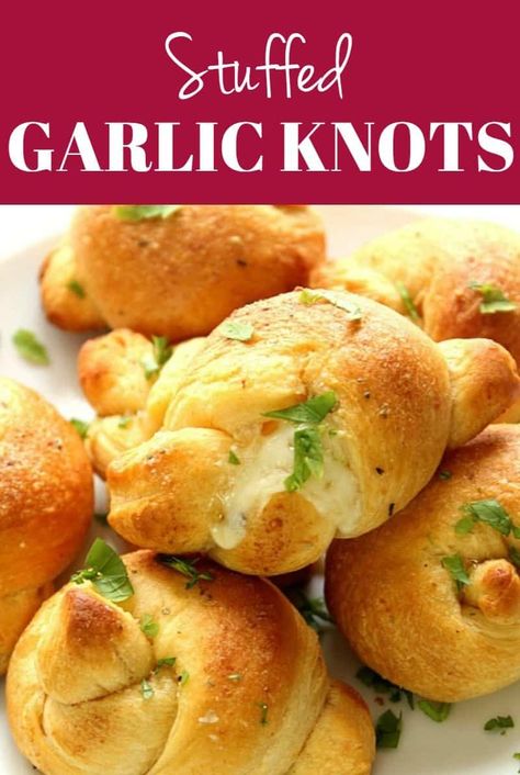 Stuffed Garlic Knots recipe - a restaurant copycat that is crazy easy to make at home! Cheese stuffed garlic knots dipped in Parmesan garlic butter are perfect for a movie night, party or a get-together. #rolls Cheese Stuffed Garlic Knots, Garlic Cheese Knots, Stuffed Garlic Knots, Frozen Bread Dough Recipes, Garlic Knots Recipe, Bread Dough Recipe, Kids Dinner, Restaurant Copycat, Bread Rolls Recipe