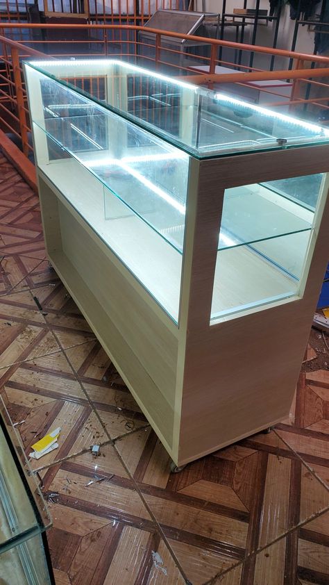 Shop Counter Ideas Retail Displays, Counter Reception Design, Glass Cupboard Design, Glass Counter Design Shop, Counter With Glass Display, Shop Fitting Glass Fronted Drawers, Glass Display Counter Retail, Glass Display Case Retail, Clear Sliding Shelves Retail Display