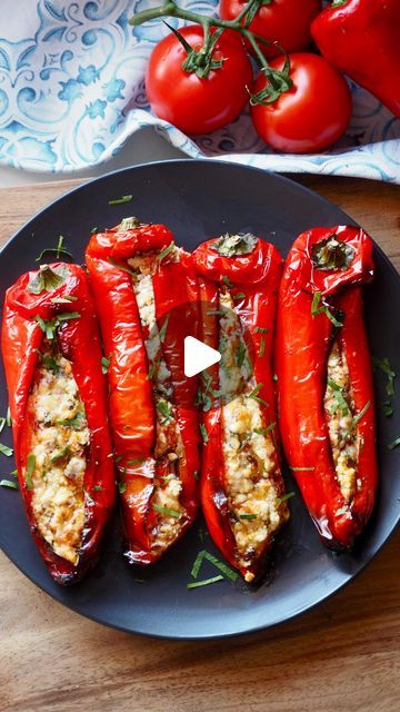 Mary Politis on Instagram: "PIPERIES GEMISTES ME FETA | Peppers Stuffed with Feta Cheese. If you’re travelling in Northern Greece, you’ll be enjoying this dish made with Florina peppers. Grown in Florina, they’re well known for their deliciously intense sweet flavour. But just as delicious with any type of bell pepper, too! Stuffed with a combination of Feta cheese and Kefalograviera (you could also use, Kefalotyri or Graviera), fresh tomato, spanish onion, and fresh mint (of course) to lift these delicious flavours.  4 Red Bell Peppers 150 grams Greek Feta Cheese 50 grams kefalograviera 1 tomato – chopped 1/4 Spanish onion - chopped 8 mint leaves – chopped 4 tablespoons Extra Virgin Olive Oil Cracked black pepper  Preheat oven to 180 degrees celcius fan forced.  Wash peppers then use a sh Feta Cheese Stuffed Peppers, Stuffed Red Pepper Recipes, Greek Stuffed Onions, Feta Peppers, Greek Sides, Stuffed Peppers Vegetarian, Cultural Dishes, Greek Stuffed Peppers, Veggie Mains