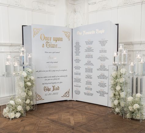 Opulent Wedding Decor | ElegantWedding.ca Fairytale Seating Chart Wedding, Fairytale Seating Chart, Castle Aesthetic Wedding, Disney Themed Wedding Decorations, Disney Wedding Seating Chart, Wedding Sitting Chart, Princess Wedding Theme, Silk Flower Decor, Fairytale Wedding Theme