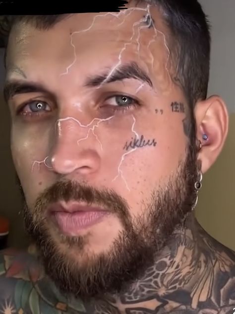 White Tattoos Lightning, Lightning Face Tattoo, White Ink Lightning Tattoo, White Ink Face Tattoo, White Face Tattoo, Red Face Tattoo, White Lightning Tattoo, Jawline Tattoo, Face Tattoo Men