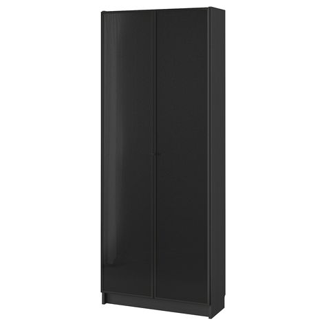 BILLY / HÖGBO Bookcase w glass doors, black-brown/black, 311/2x113/4x791/2" BILLY bookcase is a beloved icon that has many uses. HÖGBO door offers 4 expressions in 1 so you can choose the look – glass door, panel door or a personal expression with a photo, fabric or wallpaper. Bookcase With Glass Doors, Ikea Billy, Behind The Glass, Billy Bookcase, Panel Door, Tempered Glass Door, Design Line, Glass Cabinet Doors, Door Panel