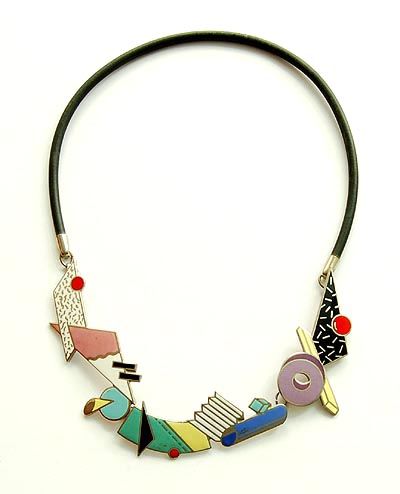 ADRIAN OLABUENAGA - Enamelled necklace Atomic on rubber chain from the jewelry series Memphis executed for Acme / USA 1984 Memphis Jewelry, Memphis Movement, Subtractive Color, Cloisonne Enamel Jewelry, Aluminum Earrings, Three Primary Colors, Memphis Style, College Work, Enamel Necklaces