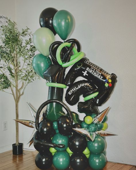 🎮 Level Up Your Birthday Game! 🎮 We had an absolute blast creating this epic balloon bouquet for a special 13-year-old gamer! 🕹️✨ His mom wanted to celebrate in style, so we decked out this bouquet with black and green balloons, complete with a game controller and gaming headset. And of course, we personalized it with his name to make his day even more awesome! 🎈💚 Swipe to see all the gamer goodness! ➡️ #Sculpted Air #GamingBirthday #BalloonBouquet #Level13 #GamerStyle #BirthdayBalloons #... Balloon Styling, Green Balloons, Happy 13th Birthday, Epic Party, Green Balloon, Birthday Games, 13th Birthday, It's Your Birthday, Balloon Bouquet