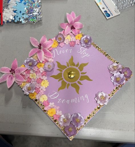 Graduation Cap Designs Rapunzel, Tangled Graduation Cap Ideas, Tangled Grad Cap, Rapunzel Grad Cap, Tangled Graduation Cap, Graduation Cap Decoration Nursing, Senior 25, Grad Cap Decorated, Graduation Cap Decoration Diy