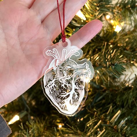 Cover your tree in hearts anatomically correct hearts. Great gift for a teacher, doctor, nurse, blurry-eyed med student, or the love of your life! 🫀❤️ Available in clear white and semitransparent red. (May or may not prove to the rest of the family that you, do indeed, have a heart. More testing and evidence may be needed.) Anatomically Correct Heart, Heart Christmas Tree, Christmas Science, Heart Christmas Ornaments, Retro Rocket, Heart Christmas, White Highlights, Christmas Ornaments Gifts, Anatomical Heart