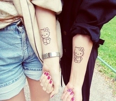 74 Matching Tattoo Ideas To Share With Someone You Love - BuzzFeed Mobile Hello Tattoo, Unique Tattoos Black Women, Hello Kitty Tattoo, Kitty Tattoo, Tattoos Infinity, Hello Kitty Tattoos, Tattoos Mandala, Inspiration Tattoo, Tattoos Geometric