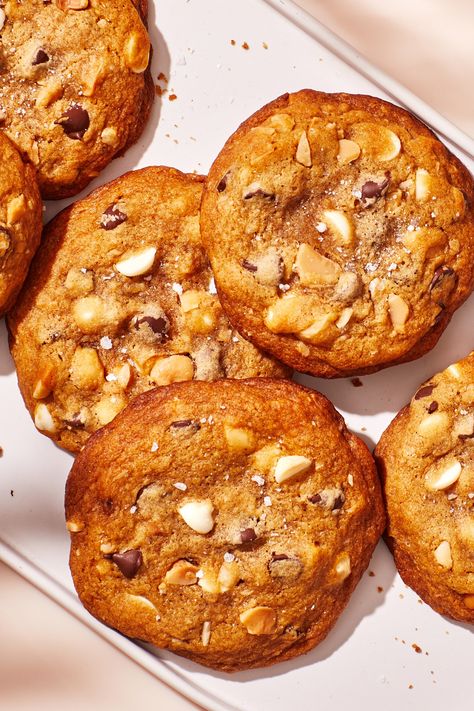 This extra-chewy and nutty chocolate chip cookie recipe is really an ode to a favorite store-bought treat: the Pepperidge Farm Sausalito. This slightly more adult spin stays true to its core essence, while scaling back the sugar to a not-too-sweet level. We've also added brown butter and a dollop of miso to provide depth and balance. Don’t forget to toast your macadamia nuts to bring out all their buttery flavor. White Chocolate Miso Cookies, Miso White Chocolate Cookies, Macadamia Desserts, Chocolate Chip Macadamia Nut Cookies, Cookies With Chips, Ribbon Cookies, White Chocolate Macadamia Cookies, Macadamia Cookies, Macadamia Nut Cookies