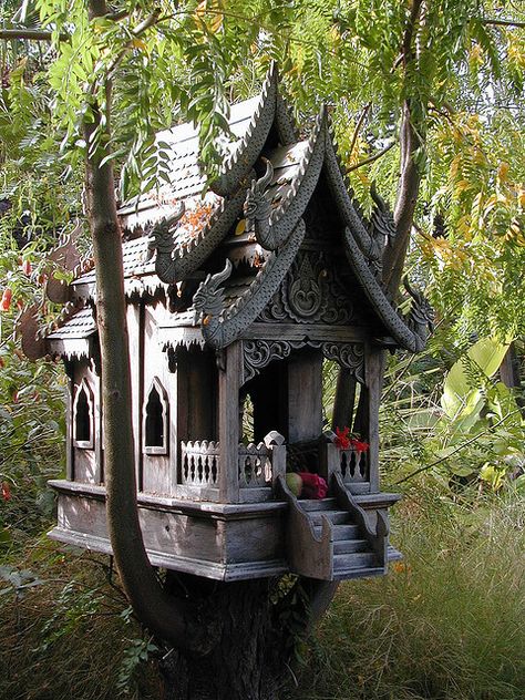 *A spirit house shelters protective spirits and prevents them from interfering with the living. (Thai Buddhist) Cool Tree Houses, Magical Tree, Fairy Houses, Fairy House, Little Houses, Play Houses, Bird Houses, Bird Bath, Tree House