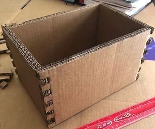 Box Jointed Cardboard Box Cardboard Box Nightstand Diy, Diy Cardboard Storage Box With Lid, Diy Models Projects, How To Make Box Out Of Cardboard, How To Make A Small Box Out Of Cardboard, Cardboard Box Upcycle, Painting Cardboard Boxes, Diy Box Storage, Cardboard Box Storage