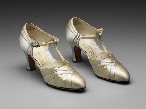 1920s, America - Pair of shoes retailed by Strawbridge & Clothier, designed by De Mura - Gold and silver T-strap heels. Gold colored with silver accents and silver heel. 1920s Dancing, 1920s America, 1920s Shoes, Silver Heel, Heels Gold, T Strap Heels, Dancing Shoes, Silver Heels, Silver Shoes