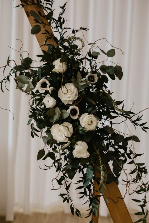 Flowers on triangle arbor Green And White Arbor Flowers, Triangle Arbor With Flowers, Black And Green Wedding Flowers, Dark Botanical Wedding, Black And Green Wedding Aesthetic, Black Green And White Wedding, Black Lantern Wedding, Black Wedding Arch, Black And Green Flowers