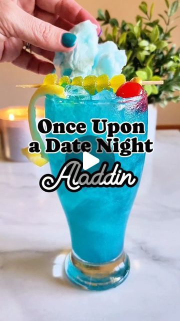 Heather Metroka ✨️ Magical Food & Cocktail Recipes on Instagram: "Welcome to Once Upon a Date Night. 🧞‍♂️✨️ Our weekly tradition where my husband and i choose a Date Nigbt Movie and I cook a feast inspired by it! This week, we are headed to the mythical streets of Agrabah to cook up a Whole New World of flavors 😅 inspired by Aladdin!  Comment LINK, and I'll send you all the deets for all the recipes and menus!   Did you guess right? It seems this was a very easy one for you, this week!   When my husband and I go out for date night at a resturaunt, we always love trying new Mediterranean resturaunts. It is his favorite cuisine by far, so I was so excited to make this meal for him this week!   For this meal, we started with a delicious delicous BLUE WISH COCKTAIL, a magical cocktail inspir Themed Dinners Ideas, Disney Themed Movie Night, Magical Food, Disney Movie Night Dinner, New Mediterranean, Movie Night Dinner, Movie Night Theme, Disney Inspired Food, Movie Night Food