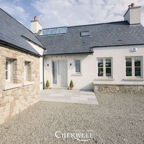 Modern Farmhouse Exterior Ireland, Modern Country Cottage Exterior, Modern Bungalow Renovation, House Designs Exterior Bungalows, Irish Cottage With Modern Extension, Cottage Style Bungalow, Uk Modern Farmhouse, Stone And Cladding Exterior, British Modern House