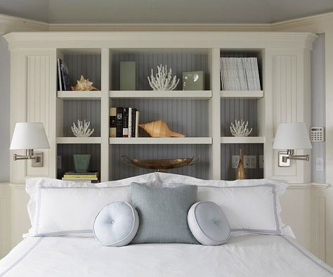 A storage-packed headboard adds a unique touch to this beachy bedroom. See more dreamy bedrooms: http://www.bhg.com/rooms/bedroom/master-bedroom/beautiful-boudoirs/?socsrc=bhgpin030113bulitinheadboard=12 Smart Bedroom, White Wainscoting, Storage Solutions Bedroom, Neutral Bedrooms, Headboard Wall, Neutral Bedroom, Headboard Storage, Dreamy Bedrooms, Beautiful Bedrooms