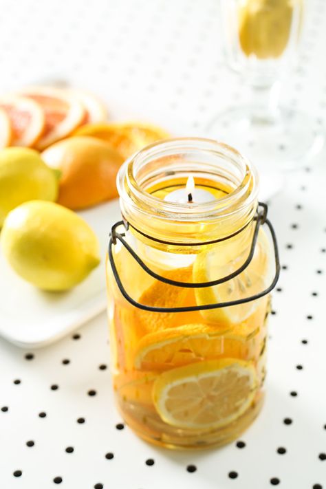 Make a mason jar candle in less than five minutes. This pretty candle is totally customizable to whatever fruits, vegetables or flowers are in season. Bath Candles Romantic, Candle Diy Mason Jar, Fruit Candles, Pretty Candle, Old Candles, Wine Bottle Diy Crafts, Mason Jar Crafts Diy, Wine Bottle Diy, Jar Candles