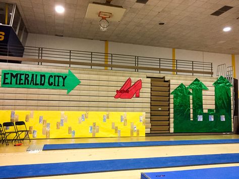 Wizard of Oz theme bleacher decoration; gymnastics meet Wizard Of Oz Homecoming Theme, Wizard Of Oz Homecoming, Wizard Of Oz Theme, Gymnastics Meet, Homecoming Decorations, Large Lollipops, Homecoming Themes, Emerald City, Bleachers