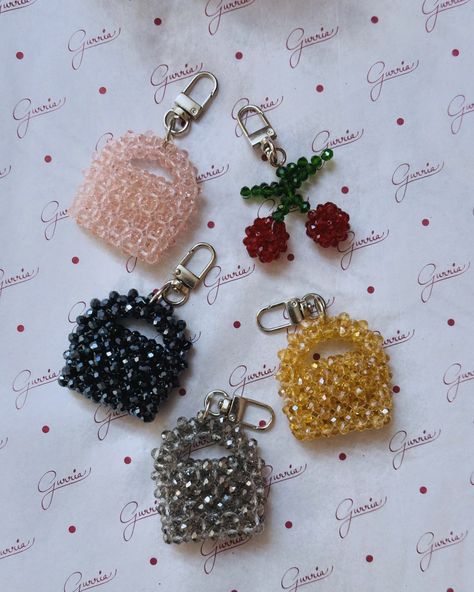 Cute little key chains 🍒👜 Carry it as a keychain or bag accessory. Handmade with love♥️ Dm to shop🛒 #gurria #ketchain #bagaccessories #handmade #cherry #crystal #crystalbag #crystalcherry #beads #india Key Chains Diy Handmade, Beads Bags Handmade, Beaded Keychain Diy, Diy Bag Charm, Beads Keychain, Hand Beaded Bag, Bead Keychain, Aesthetic Accessories, Crystal Keychain