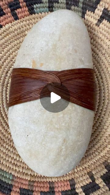 Lori Marshall on Instagram: "Just finished this one. It’s bigger than it looks. A simple yet elegant wrap compliments this rock. Will add this to my Etsy shop this week. #wrappedrocks #zenwrockz #zenrocks #energy #community #giftsandtalents #energyrocks #energystones #zenstones #collection #wrockz #giftideas #oneofakind #rocks #Wrappedstones #uniquerocks #prayerstones #gratitudestones #gratituderocks #elegant #leatherwrap" Rock Wrapping Tutorial, Rock Wrapping, Wrapped Rocks, Zen Rock, Art Weaving, Stone Wrapping, Energy Stones, Beach Art, Stone Art