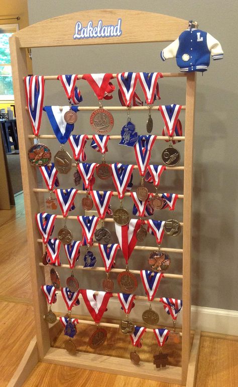 Display for Graduation Party - High School medals Graduation Medal Display, Graduation Displays, Diploma Display Wall, Party Picture Display Ideas, Party Picture Display, Running Display, Picture Display Ideas, Graduation Party Picture Display, Display Medals