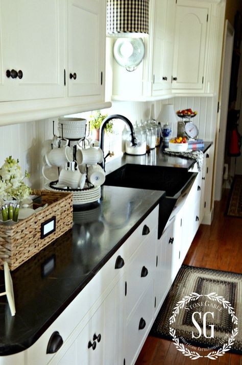 WHAT IS FARMHOUSE STYLE AND 10 WAYS TO GET IT - StoneGable Soapstone Pendant, Paint Countertops, Best Kitchen Cabinet Paint, Farmhouse Kitchen Countertops, Stone Gable, Sink Window, Bottle Dryer, Countertops Black, Port Austin