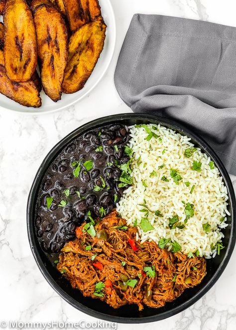 This Venezuelan Pabellon Bowl is meal perfection! Shredded beef, black beans, white rice and fried plantains, make this dish a hearty, filling and most delicious lunch or dinner ever. https://mommyshomecooking.com Sancocho Recipe, Fried Plantains, Venezuelan Food, Rice Recipes For Dinner, Spanish Dishes, Delicious Lunch, Shredded Beef, Yummy Lunches, Evening Meals