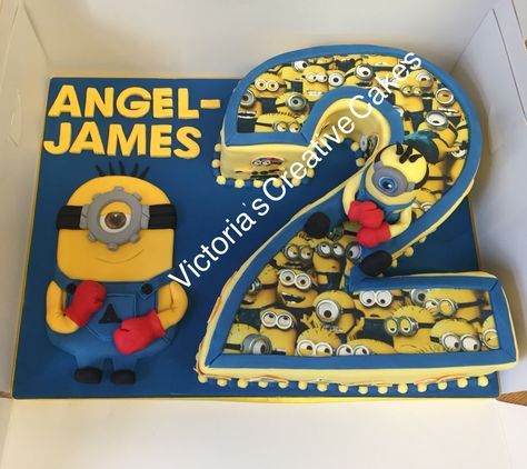 Minion number 2 birthday cake with a boxing minion Minion Number Cake, 2 Birthday Cake, Number Cakes, Cake Decorating Designs, Frosted Flakes Cereal Box, Minion, 2nd Birthday, Amazing Cakes, Cake Decorating