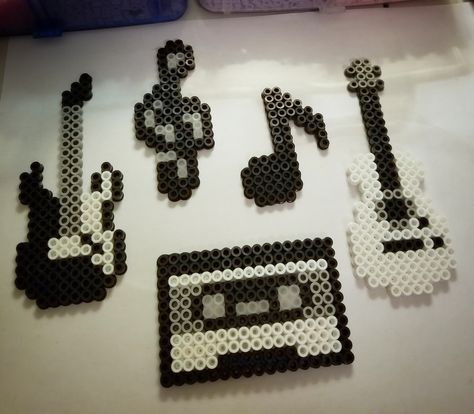 Perler bead music theme magnet set! Perler Bead Patterns Music, Perler Bead Music, Perler Bead Patterns 29x29, Grunge Perler Bead Patterns, Tiny Perler Beads, Perler Templates, Perler Bead Patterns Emo, Perler Bead Magnets, Goth Perler Beads