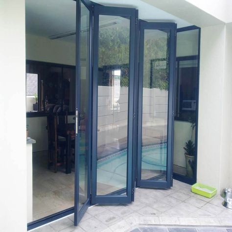 Aluminum bifold doors ideas | Aluminum doors | Industrial Stacking Door Glass Slider Doors, Modern Bathroom Door, Sliding Folding Door, Accordion Glass Doors, Foldable Door, Retractable Glass Doors, Stacking Doors, Accordion Doors, Aluminum Doors