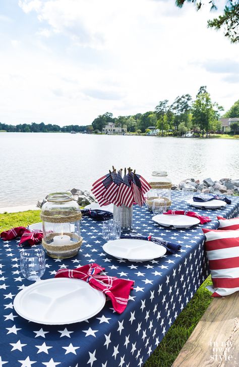 Fourth of July picnic table set up along the shores of a lake. #patriotictablesetting #outdoortablesetting #redwhiteandblue Picnic Tablecloth, Fourth Of July Decor, Outdoor Eating, Outdoor Table Settings, 4th Of July Decorations, Memorial Day Weekend, Table Set Up, 4th Of July Party, Own Style