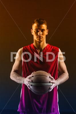 Portrait of basketball player holding a ball on a gym Stock Photos #AD ,#player#holding#Portrait#basketball Ball Reference, Photo Basketball, Human Poses Reference, Human Poses, Basketball Player, Model Release, Basketball Players, Photography Props, Pose Reference