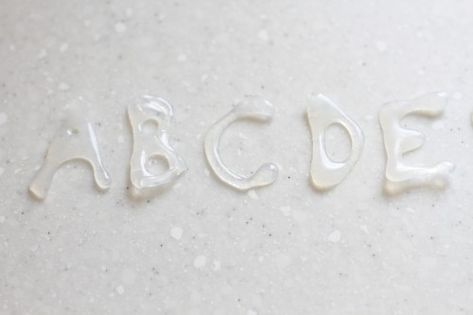 Invisible glue gun letters/numbers. Saw another blog post about putting them in a sensory tub with water or rice. Invisible Letters, Sensory Tubs, Sensory Tub, Vision Therapy, Sensory Rooms, Physical Education Games, Reading Games, Sensory Boxes, Team Building Activities