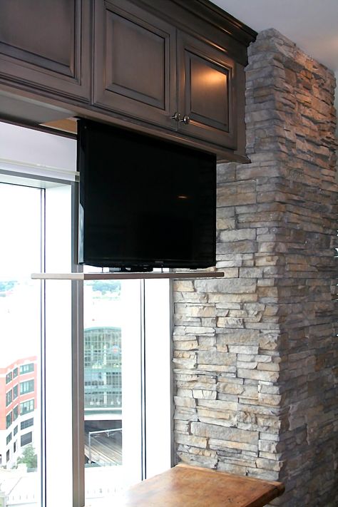 What a unique way to store your Television in a kitchen. #RhodeIslandContractor Tv In Kitchen Cabinet, Kitchen Prep Table, Prep Table, Tv In Bathroom, Tv In Kitchen, Hidden Tv, Hidden Kitchen, Kitchen Prep, Tv Design