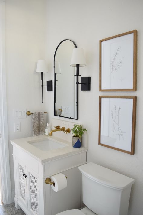 Modern traditional small bathroom with Sherwin Williams "Snowbound" walls, white vanity and brass wall mount faucet. Snowbound Walls, White Half Bathroom, Brass Wall Mount Faucet, Paint Bathroom Sink, Bathroom Wall Faucets, Powder Bathroom Ideas, Sherwin Williams Snowbound, Small White Bathrooms, Small Half Bath