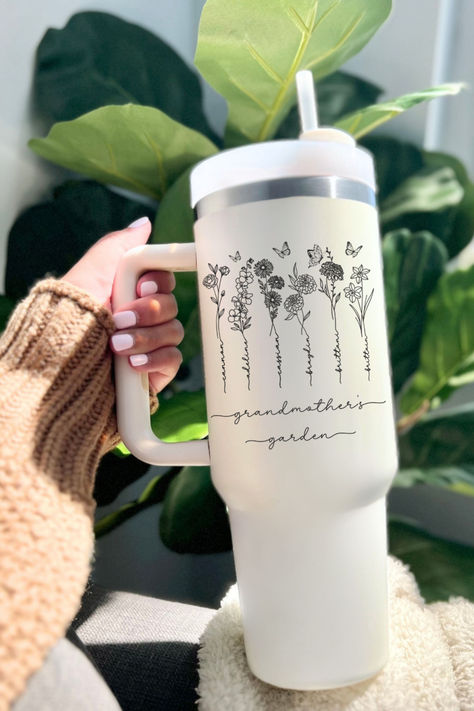 Cherish generations of love with our 40oz Stanley tumbler, elegantly laser-engraved with the birth flowers of a mother, grandmother, and great-grandmother's cherished children and (great) grandchildren. A heartfelt keepsake for sipping your iced beverages cold while celebrating family connections. Kitchenware Ideas, Generations Of Love, Great Grandchildren, Iced Beverages, Thermal Mug, Stanley Tumbler, Iced Drinks, Embroidered Hoodie, Tumbler Design