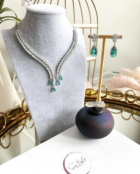 Make a statement with our Mint Green CZ Diamond Necklace – a symbol of fearless elegance! 💎✨ It’s been causing a stir, and now it’s your turn to shine. Shop now at saajbyg.com or DM to get yours! #CZNecklaceSet #classywomen #SaajByG #DCWaleDesi #AmericanDiamonds #indiandesignerjewellery [Glam, classy, mint green CZ necklace set, sleek American diamond set, mint green American diamond set, dc jewelry, dmv jewelry,reception jewelry, wedding dress, New York jewelry, Indian jewelry] Sleek Diamond Necklace, Dc Jewelry, New York Jewelry, Diamond Necklace Set, Cz Necklace, Jewelry Indian, American Diamond, Diamond Set, Jewelry Wedding