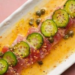 Tuna Crudo with Citrus Caper Vinaigrette - Lindsey Eats Raw Fish Recipes, Tuna Crudo, Caper Vinaigrette, Pad Krapow, Thai Basil Chicken, Tuna Sashimi, Side Crunches, Citrus Vinaigrette, Fresh Tuna