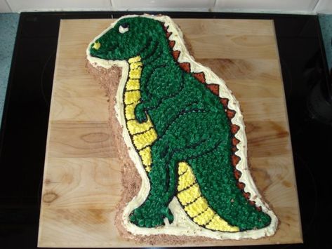 Dinosaur Sponge Cake Wilton Pan Hired From Our Local Shop Vanilla Sponge With Buttericing Covering And Grated Chocolate Around The Sides... Dinosaur Cake Pan, Dino Cake, Dinosaur Birthday Cakes, Laughing Cow, Savory Cakes, Cake Central, Salty Cake, Vanilla Sponge, Dinosaur Cake