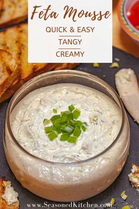 Feta Mousse is tangy, creamy and super flavorful. It’s quick and easy to prepare, too! Just 4 basic ingredients (feta, sour cream, EVOO and green onion) are accented by garlic powder, oregano, cayenne pepper and salt. Serve with grilled bread for an easy and elegant appetizer. #fetarecipes #easyappetizers #fetamousse #seasonedkitchen #pantryingredients #makeaheadappetizers Feta Mousse, Make Ahead Appetizers, Elegant Appetizers, Feta Recipes, Grilled Bread, Quick And Easy Appetizers, Small Food Processor, Mousse Recipes, Green Onion