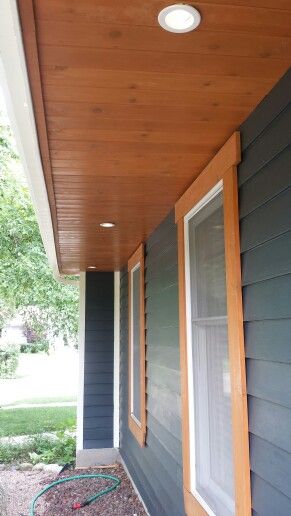 Cedar tongue and groove under the overhang. Cedar Exterior Trim, Wood Trim Around Windows Exterior, Cedar Trimmed Windows Exterior, Wood Exterior Window Trim, Tongue And Groove Soffit, Wood Window Trim Exterior, Cedar Soffit Exterior, Wood Trim Exterior House, Cedar Window Trim