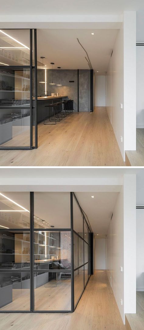 Black framed glass walls can be used to close off this modern kitchen from the other spaces of the penthouse when needed. Interior Design Minimalist, Kitchen Floor Plans, The Penthouse, Glass Walls, Kitchen Designs Layout, Cots, Design Case, Interior Design Trends, Kitchen Flooring