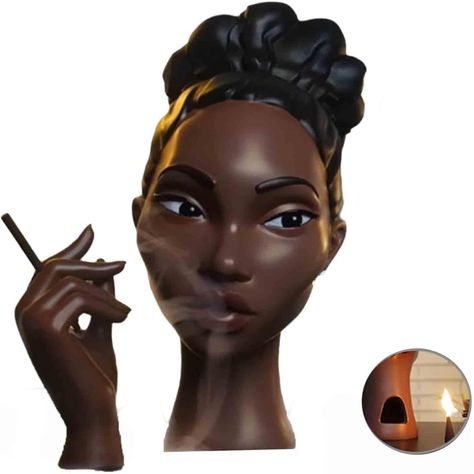 PRICES MAY VARY. 【Head Incense Burner Black Woman】The most unique incense burner that will elevate any space. Simply place an incense cone in the opening at the back of her neck, and watch as the fragrant smoke gently flows from her lips and creates an alluring and calming effect 【High-Quality Craftsmanship】 Made from Durable Resin Material, This Black Girl Incense Holder Head Is Skillfully Crafted with Utmost Precision. Its Smooth and Shiny Surface Not Only Enhances Its Visual Appeal but Also E Room Waterfall, Waterfall Decor, Ascension Island, Incense Cone, Black Lady, Women Face, Female Head, Stylish Backpacks, Central African