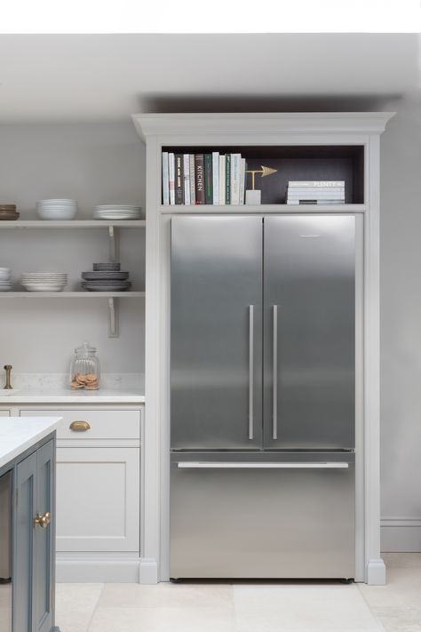 Fisher & Paykel fridge freezer housed in Nickleby cabinetry with storage space above for cookbooks. #humphreymunsonblog Fridge Nook, Above Fridge Storage, Fridge Surround, Contemporary Open Plan Kitchens, Above Fridge, Refrigerator Ideas, Fridge Kitchen, Humphrey Munson, Refrigerator Cabinet